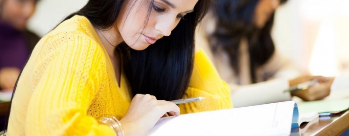 college students studying in classroom